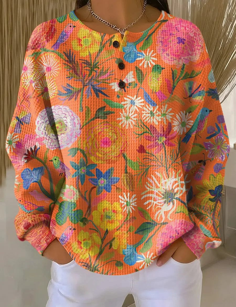 LITHUA Oranžinės gėlės / S Freja™ - Megztinis su spalvingu gėlių raštu