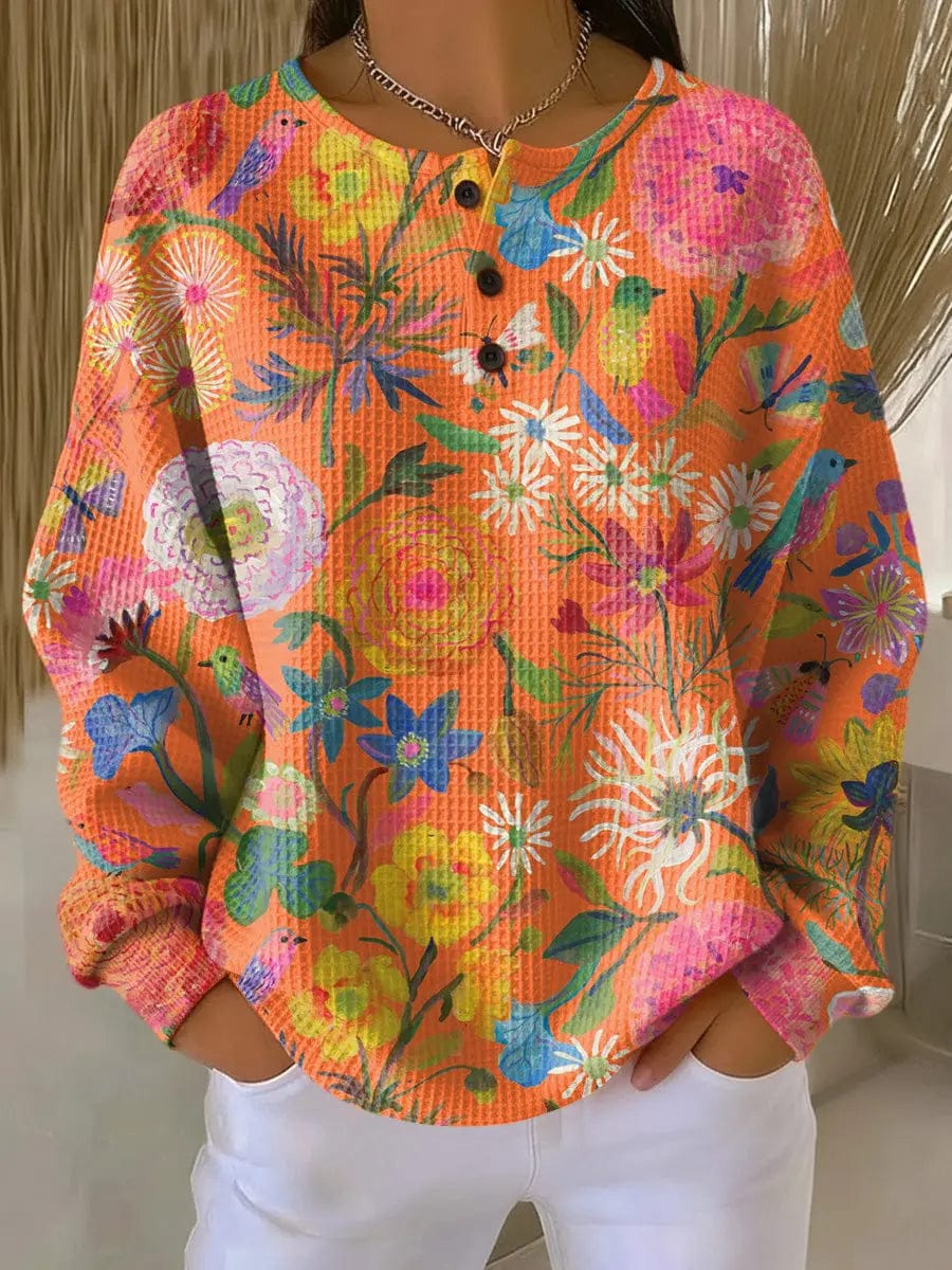 LITHUA Oranžinės gėlės / S Freja™ - Megztinis su spalvingu gėlių raštu