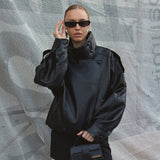 Carla Asimetrinė Odinė Striukė