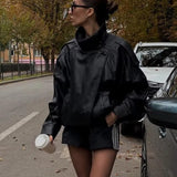 Carla Asimetrinė Odinė Striukė