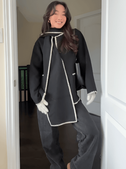 Velira Nellie | Black Wool Cape Coat with Contrast Trim Nellie | Juodas vilnos apsiaustas su kontrastingais akcentais