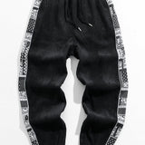 Velira Pants Šviesos džinsinio audinio paisley rašto kelnės