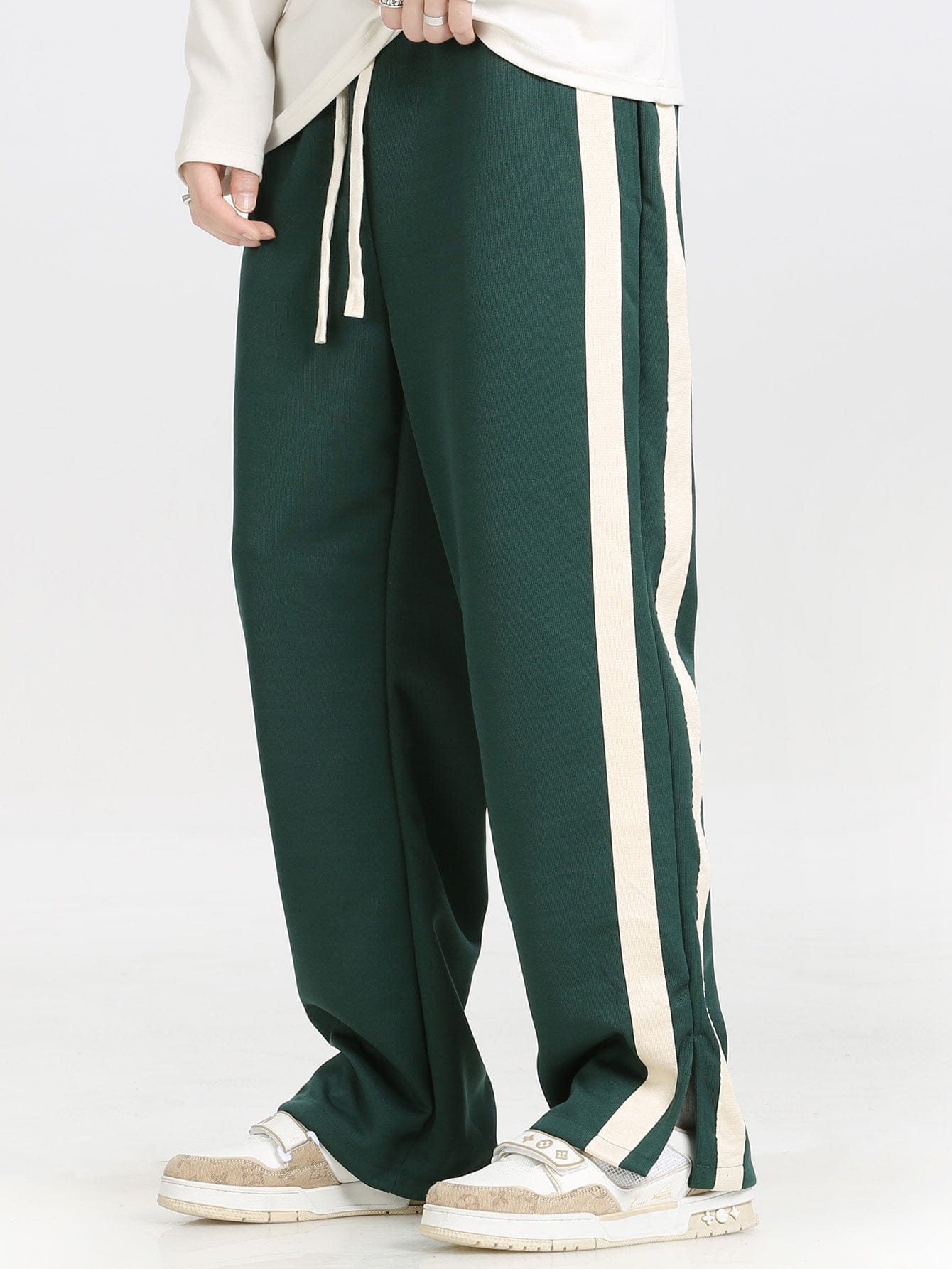 Velira Pants tamsiai žalia / XS Pantalonai su plyšiu ir juostelėmis