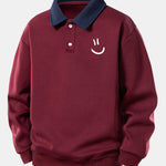 Velira Sweatshirts Bordo / XS Atsipalaidavusio kirpimo šypsenėlės printo kontrastingas polo džemperis