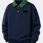Velira Sweatshirts Tamsiai mėlyna / XS Atsipalaidavęs juodos katės rašto kontrastingas polo džemperis