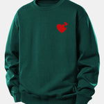 Velira Sweatshirts Tamsiai žalia / XS Širdies dėlionės spaudinys laisvo kirpimo džemperis